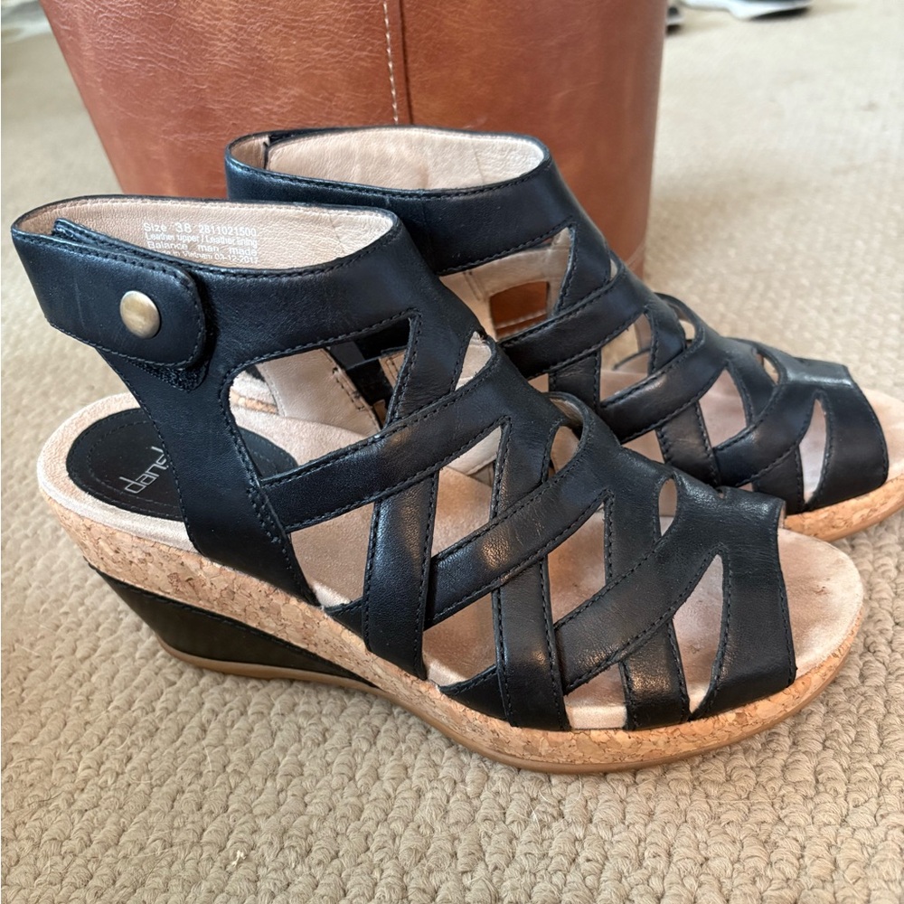 Dansko Cecily Black Leather Wedge Sandal with Crisscross Strap